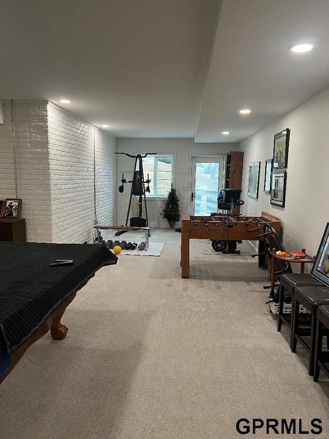 recreation room featuring carpet flooring, recessed lighting, brick wall, and billiards