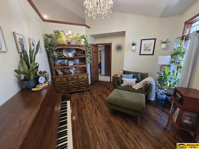 living room with vaulted ceiling, an inviting chandelier, and wood finished floors
