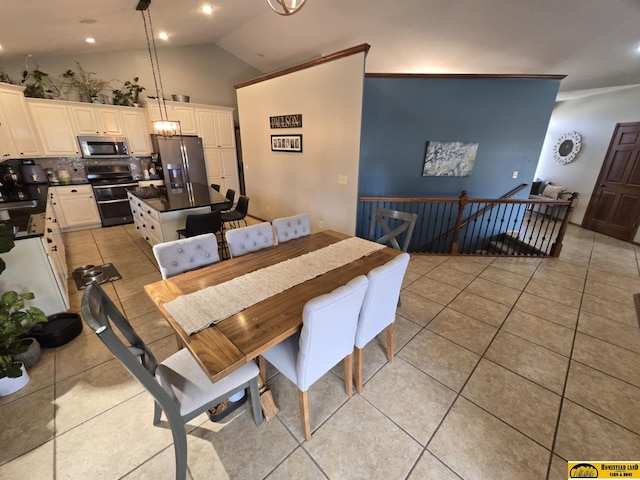dining space with light tile patterned flooring, recessed lighting, and vaulted ceiling