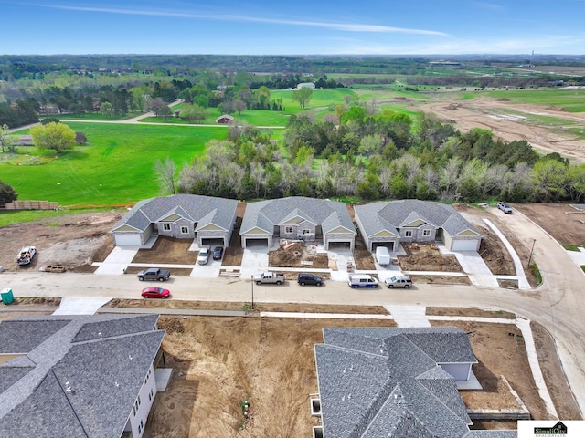 drone / aerial view featuring view of golf course