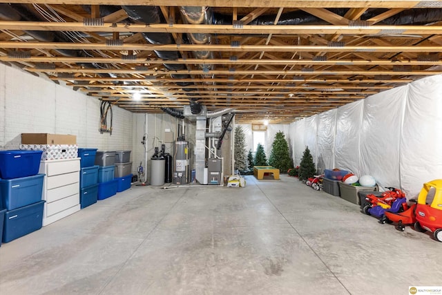 basement with heating unit and gas water heater