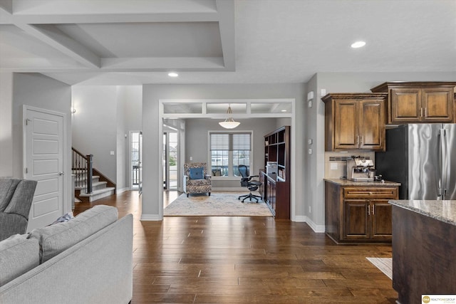 interior space with baseboards, recessed lighting, stairs, and dark wood finished floors