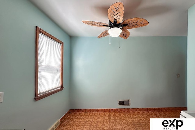 6027 S 36th St, Omaha, NE 68107 - empty room featuring visible vents, baseboards, and ceiling fan