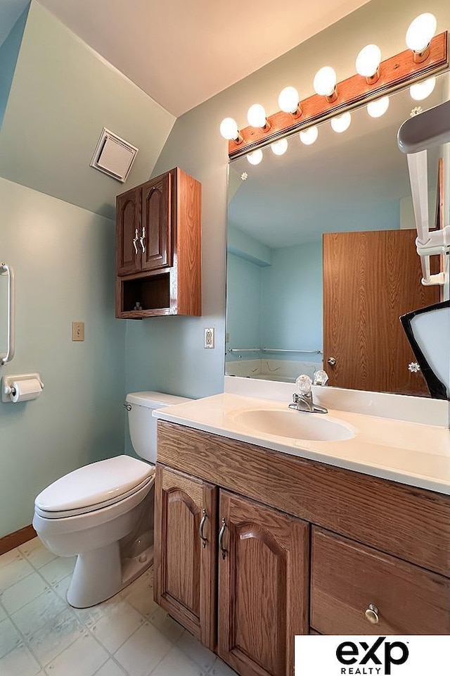 6027 S 36th St, Omaha, NE 68107 - bathroom with toilet and vanity