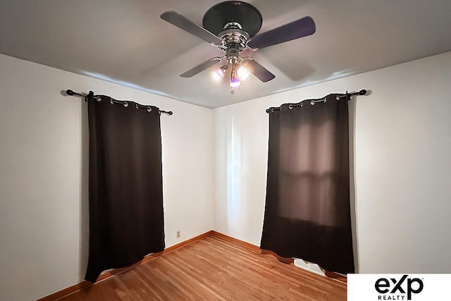 6027 S 36th St, Omaha, NE 68107 - unfurnished room featuring baseboards, ceiling fan, and wood finished floors