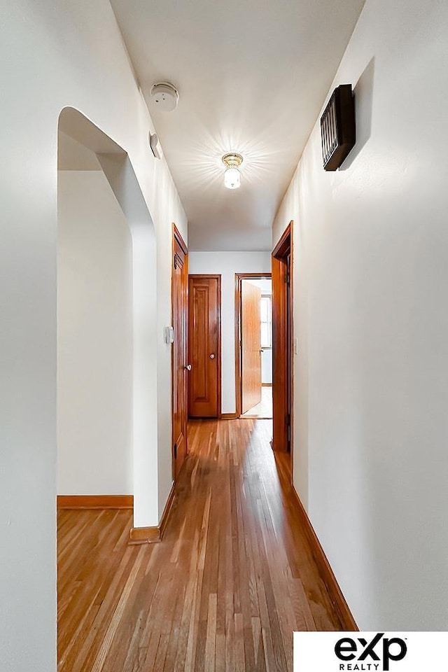 6027 S 36th St, Omaha, NE 68107 - hallway with light wood-type flooring and baseboards