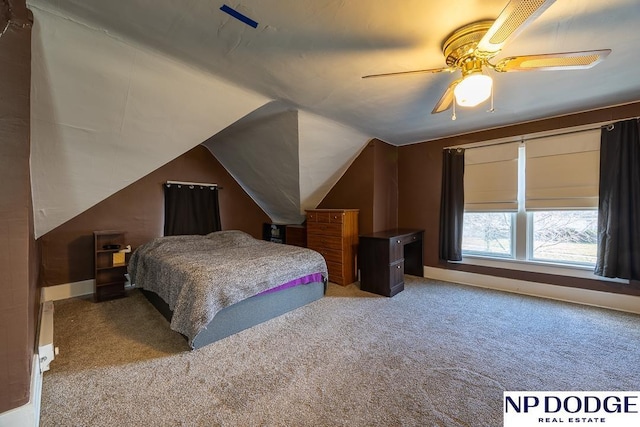 1042 Seward St, Seward, NE 68434 - bedroom featuring vaulted ceiling, baseboards, carpet floors, and ceiling fan