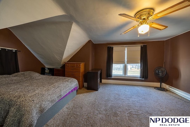 1042 Seward St, Seward, NE 68434 - bedroom featuring baseboards, a ceiling fan, lofted ceiling, and carpet floors
