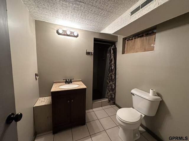 108 S Quince Ave, Dewitt, NE 68341 - full bathroom with visible vents, toilet, an ornate ceiling, a shower stall, and vanity