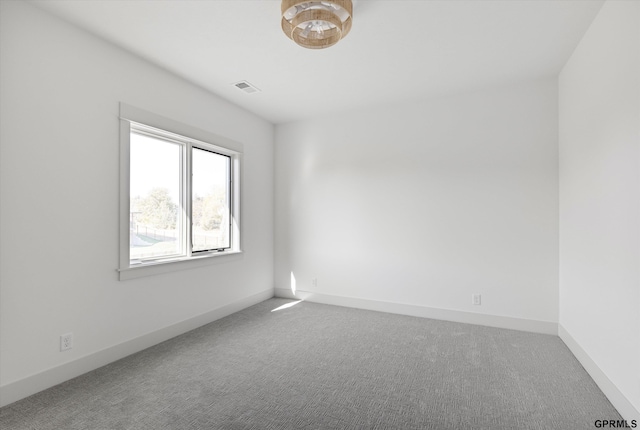 10907 N 167th St, Bennington, NE 68007 - empty room with carpet flooring and baseboards