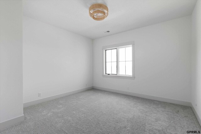 10907 N 167th St, Bennington, NE 68007 - unfurnished room featuring carpet floors and baseboards