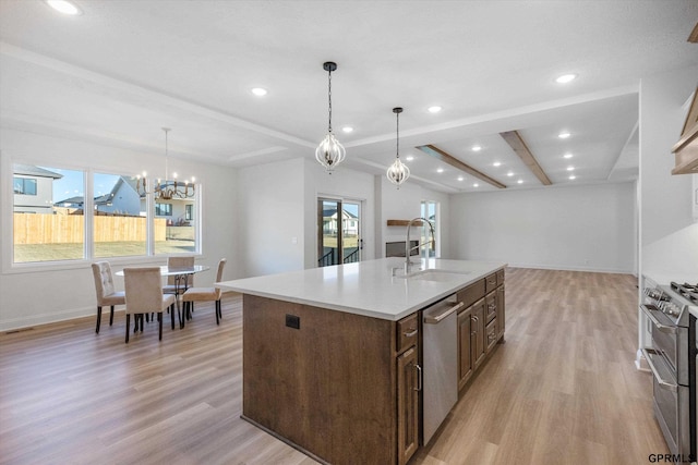10907 N 167th St, Bennington, NE 68007 - kitchen featuring a sink, light wood finished floors, appliances with stainless steel finishes, baseboards, and recessed lighting