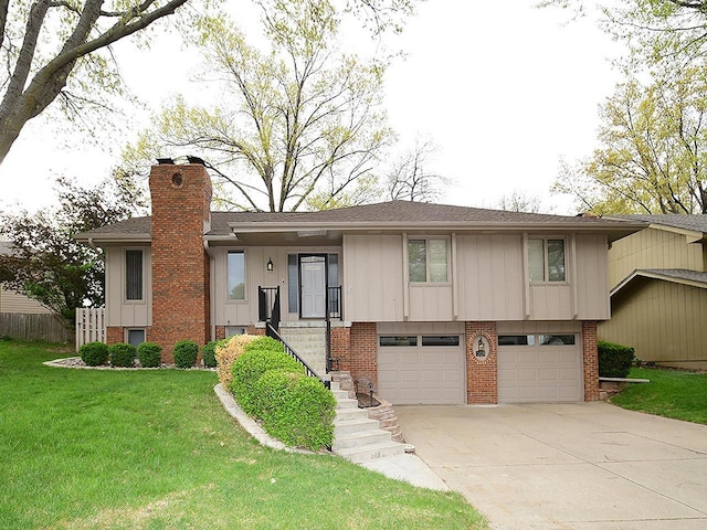 view of front facade featuring an attached garage, brick siding, a front yard, a chimney, and concrete driveway