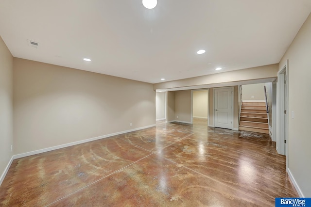unfurnished bedroom featuring finished concrete floors, baseboards, visible vents, and recessed lighting