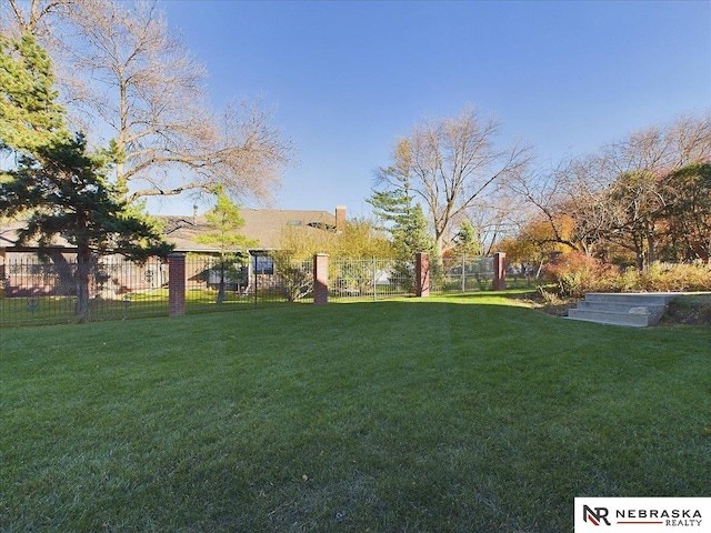 view of yard with fence