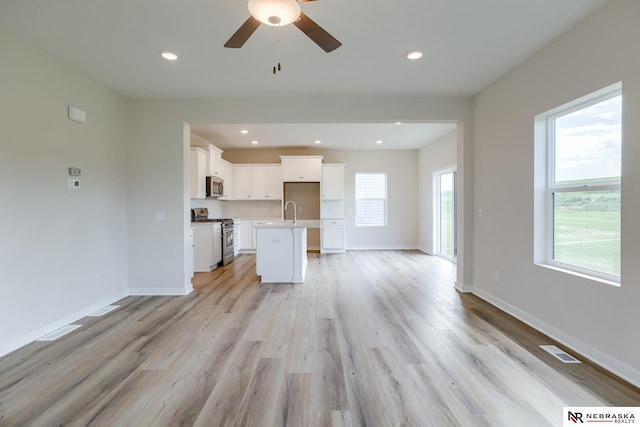 17547 Potter St, Bennington, NE 68007 - unfurnished living room with recessed lighting, baseboards, ceiling fan, and visible vents