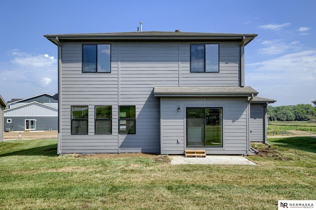 17547 Potter St, Bennington, NE 68007 - back of property featuring a lawn