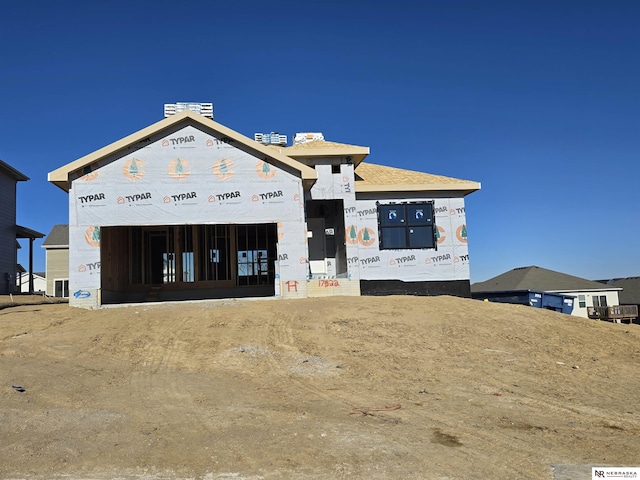 17522 Hanover St, Bennington, NE 68007 - unfinished property featuring an attached garage