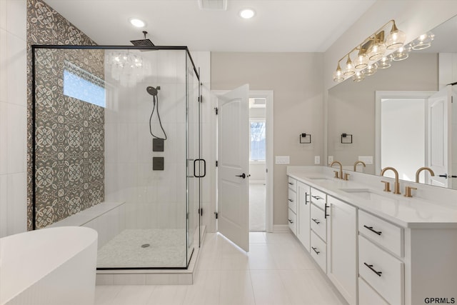 bathroom featuring double vanity, a sink, recessed lighting, and a shower stall