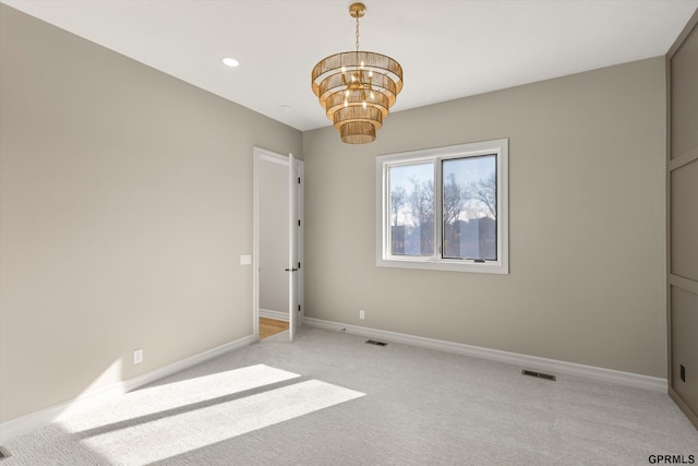 interior space featuring light colored carpet, a notable chandelier, baseboards, visible vents, and recessed lighting