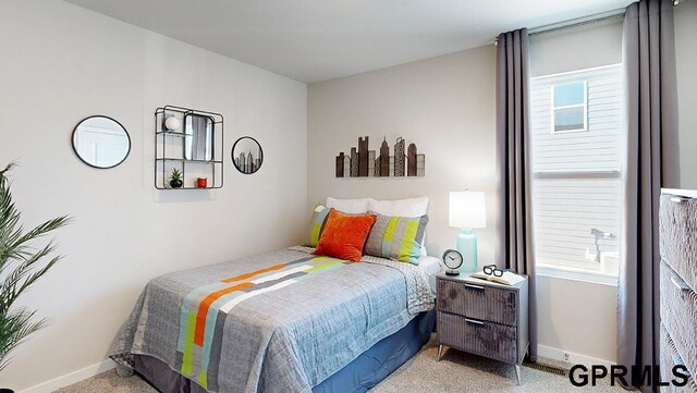 17650 Portal St, Omaha, NE 68136 - bedroom featuring light carpet and baseboards