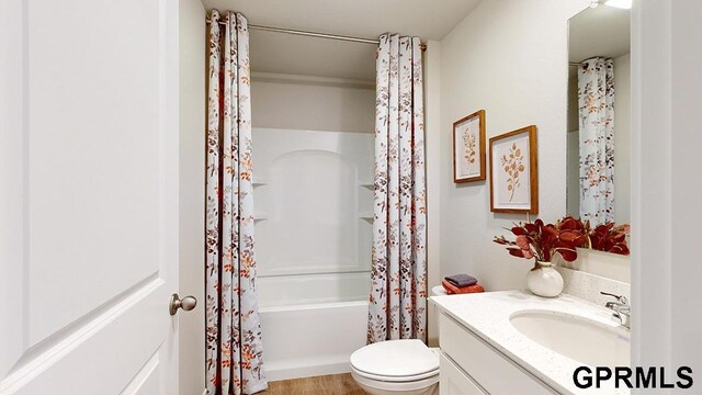 17650 Portal St, Omaha, NE 68136 - bathroom featuring toilet, vanity, and shower / bath combo with shower curtain