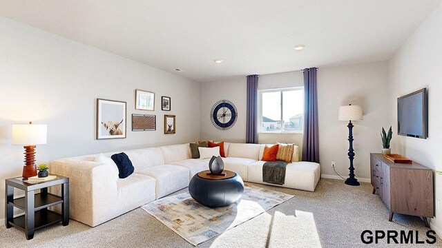 17650 Portal St, Omaha, NE 68136 - living room featuring baseboards and light colored carpet