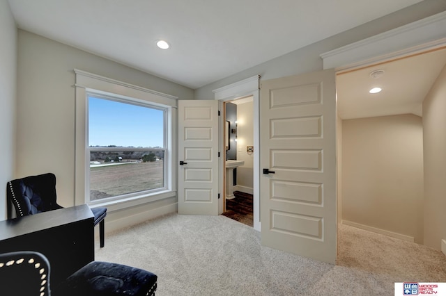 living area featuring baseboards, carpet floors, and recessed lighting