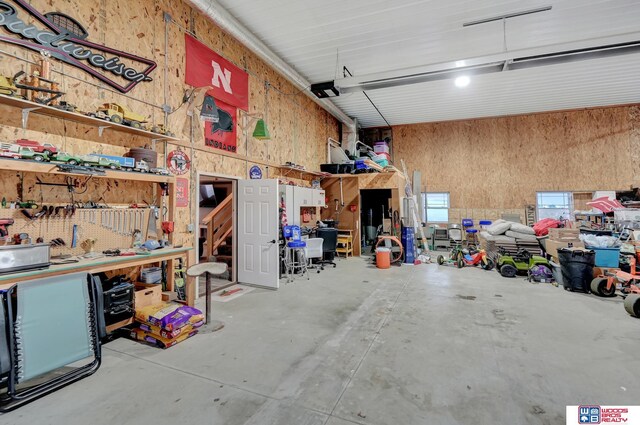 garage with a workshop area