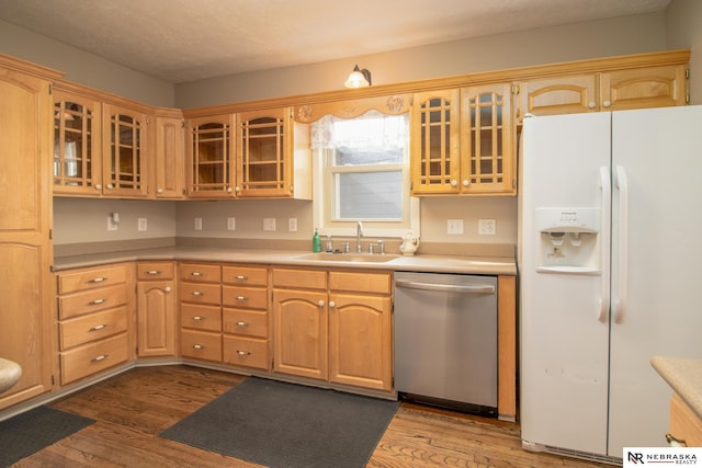 1465 Grant St, Blair, NE 68008 - kitchen with white refrigerator with ice dispenser, a sink, dishwasher, and dark wood finished floors