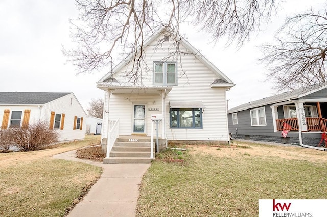 bungalow with a front lawn