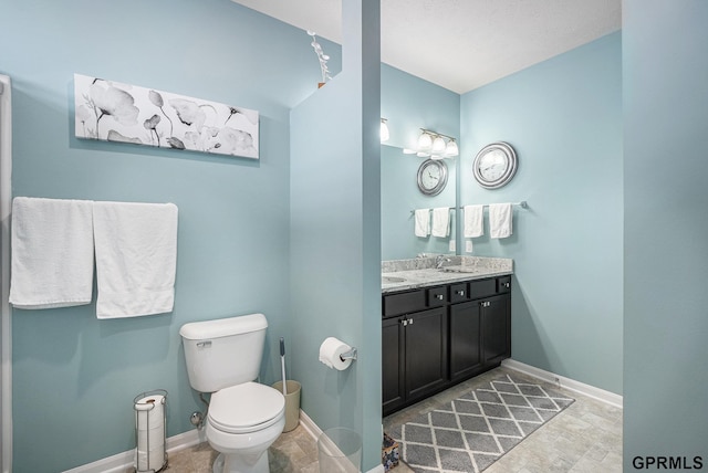 16604 Weber St, Bennington, NE 68007 - bathroom with baseboards, toilet, and vanity