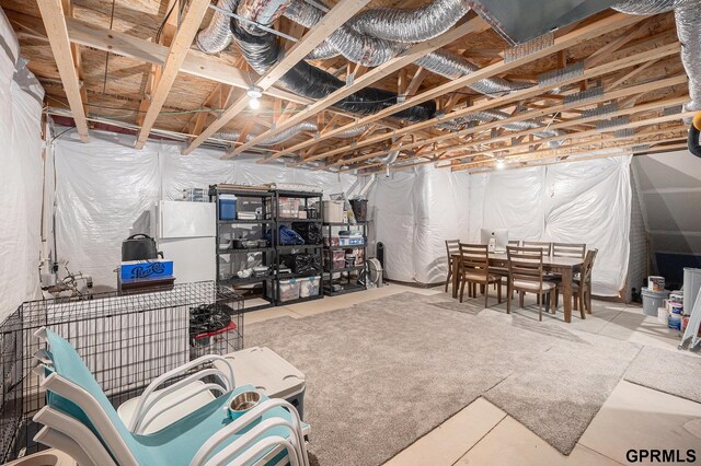 16604 Weber St, Bennington, NE 68007 - unfinished basement with freestanding refrigerator