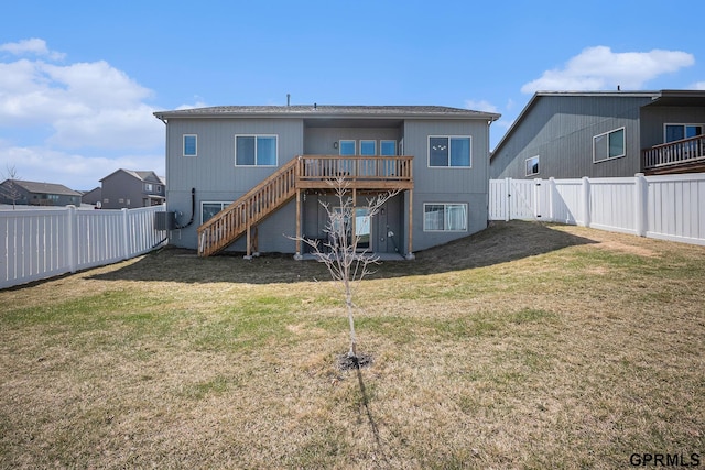 16604 Weber St, Bennington, NE 68007 - back of house with a fenced backyard, a wooden deck, stairway, and a yard