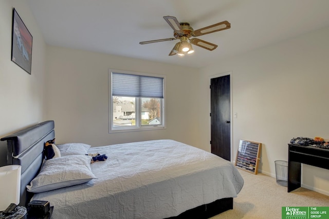 bedroom featuring a ceiling fan, carpet floors, and baseboards
