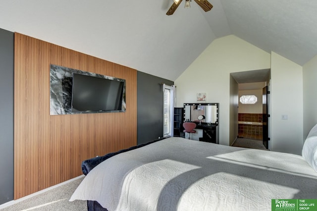 bedroom with lofted ceiling, ceiling fan, wooden walls, and carpet floors