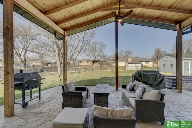 view of patio featuring a residential view, an outdoor hangout area, fence, and grilling area