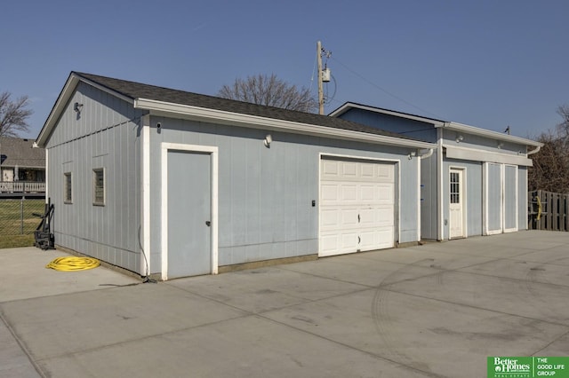 garage with fence