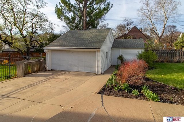detached garage with fence