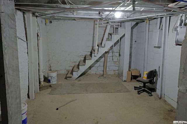 unfinished basement with stairs