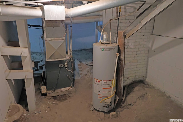 utility room with gas water heater