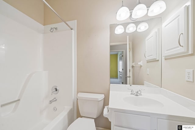 full bath featuring toilet, vanity, and bathing tub / shower combination