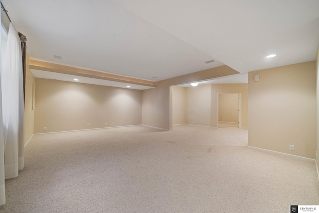 finished below grade area featuring carpet floors, baseboards, and recessed lighting
