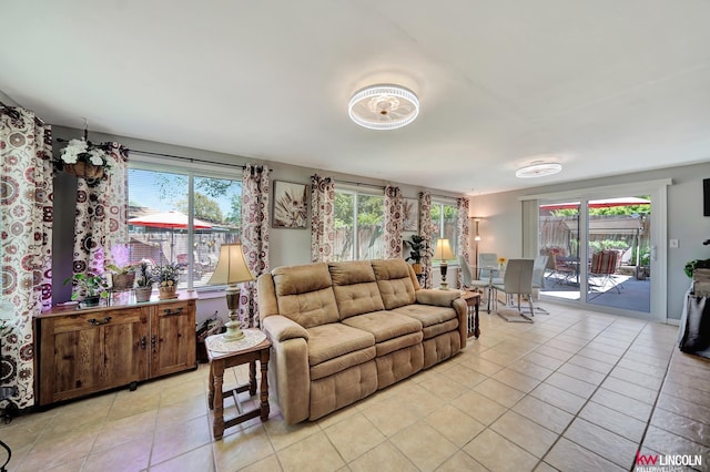 living room featuring light tile patterned floors and healthy amount of natural light