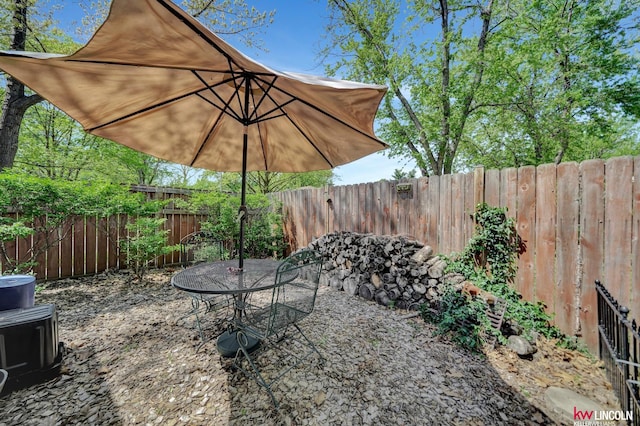 view of patio / terrace with a fenced backyard and outdoor dining area