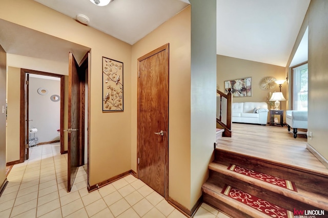 stairs featuring baseboards