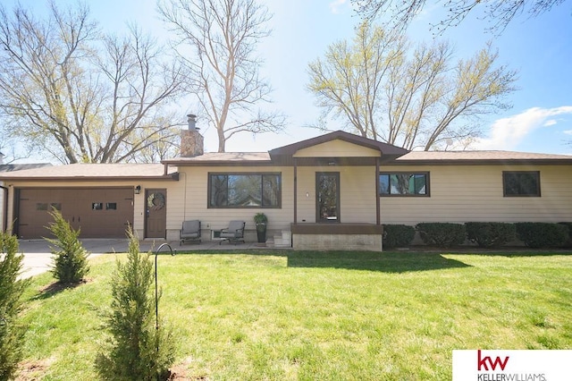 ranch-style house with concrete driveway, a front yard, a chimney, and an attached garage