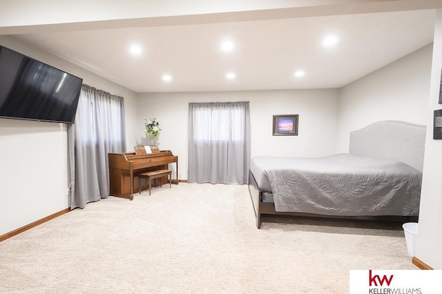 bedroom featuring light colored carpet, baseboards, and recessed lighting