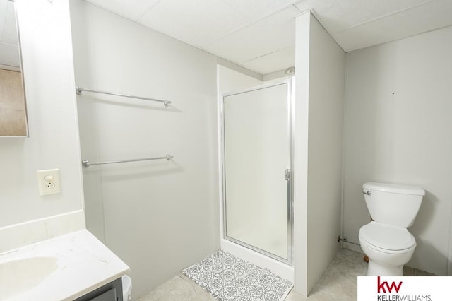 full bathroom with tile patterned floors, toilet, a stall shower, and vanity