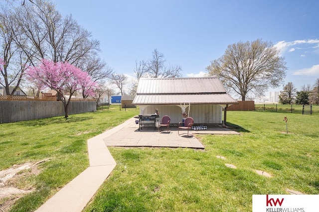 view of yard with a patio and a fenced backyard